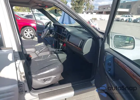 1997 Jeep Grand Cherokee Limited z USA, uszkodzony, nr VIN 1J4GZ78Y9VC699071